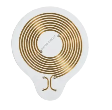 Circular copper spiral heating element mounted on a white ceramic base, like an electric stove burner.